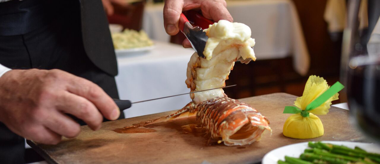 Lobster being prepared tableside