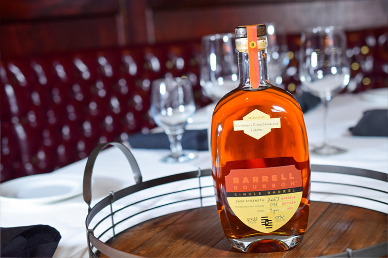 a bottle of Barrell Bourbon on a tray at Christner’s Steakhouse