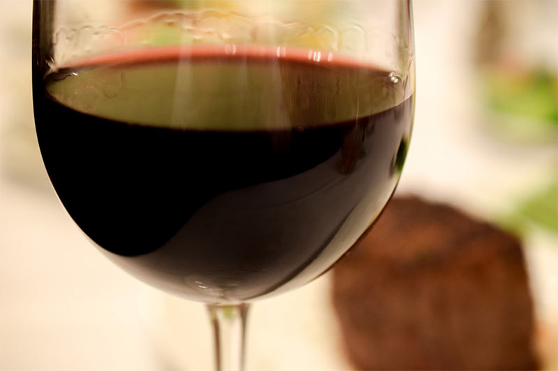 Dark wine in a glass